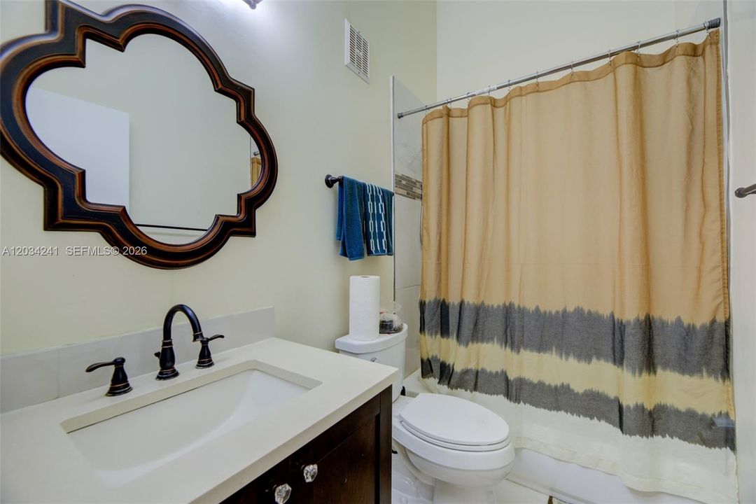 The second full bathroom features an upgraded vanity and shower/tub!