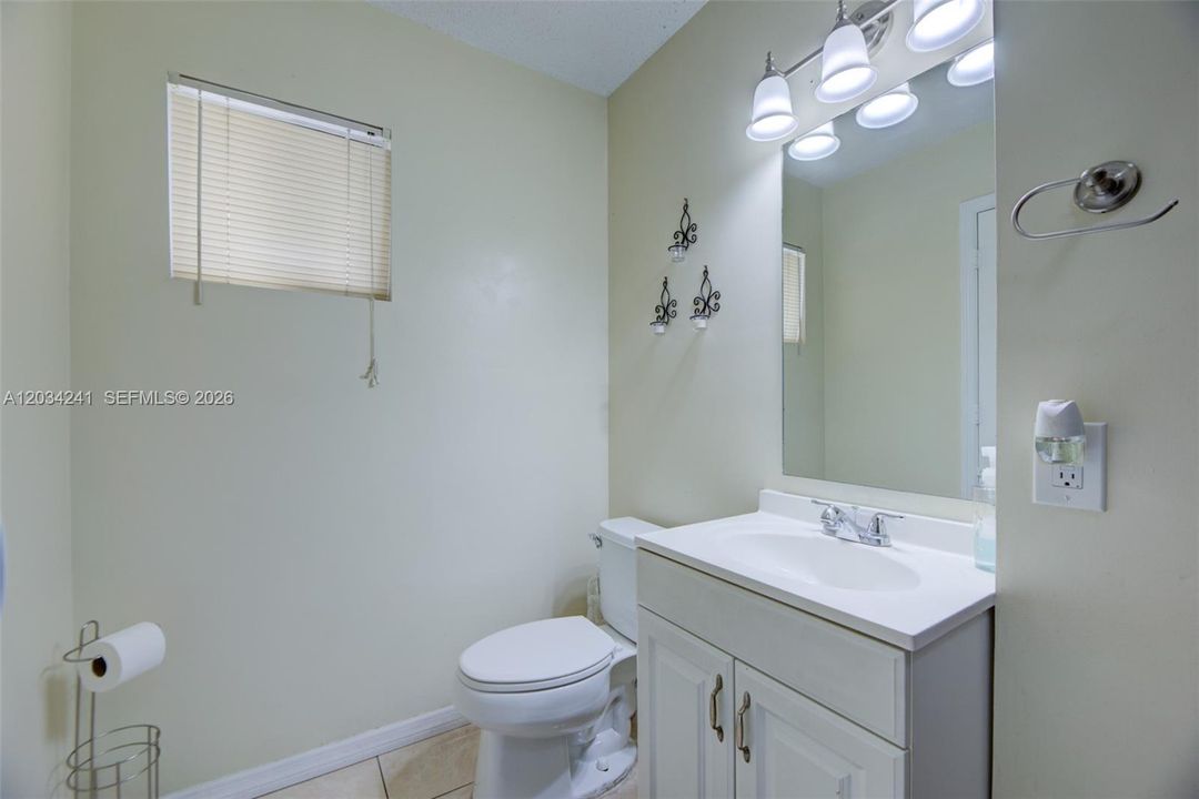 the half bath is located downstairs