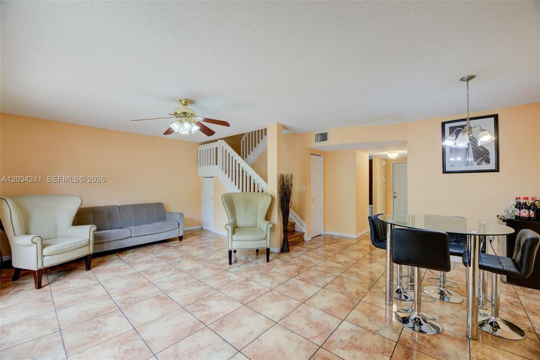 The stairs double as a closet for extra storage that can be accessed from two locations!