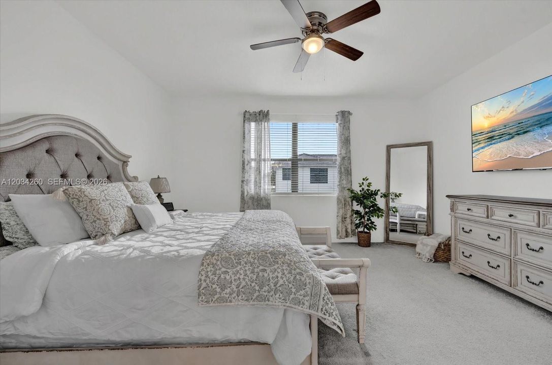 Primary Bedroom w/ pool view