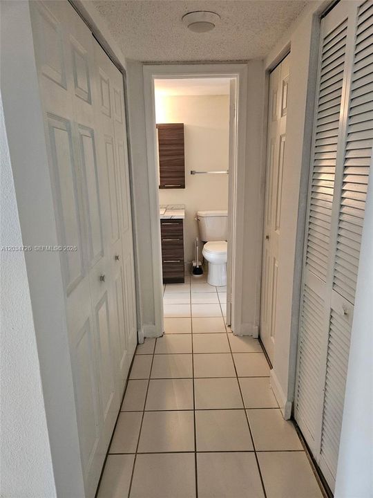 Entrance to bathroom for guest and extra closed