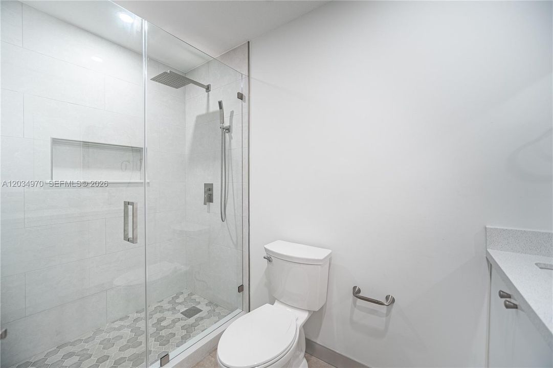 Brand new shower and toilet