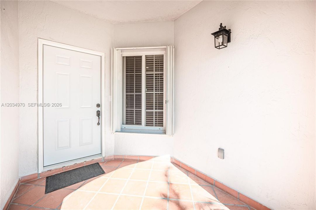 Entrance to the unit.  Kitchen and family room immediately to the left off the entry
