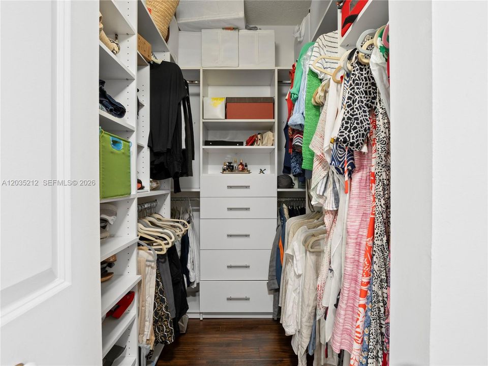 MASTER BEDROOM CUSTOM BUILT WALK-IN CLOSET