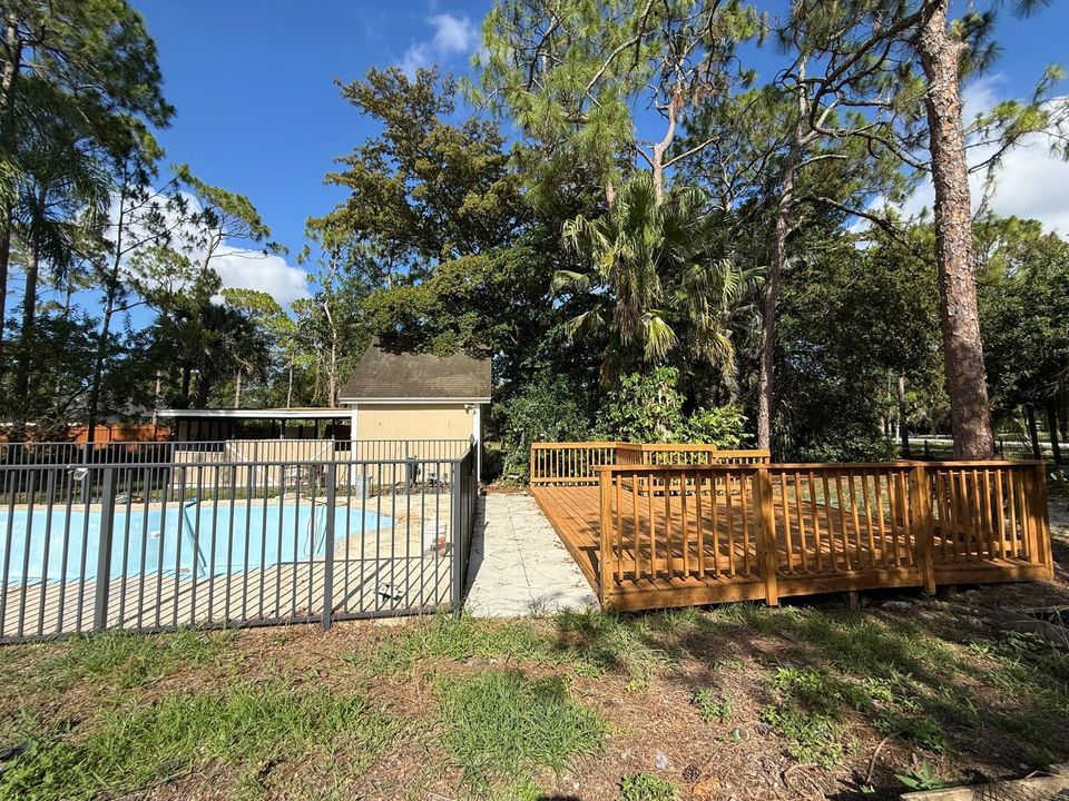 back deck with pool