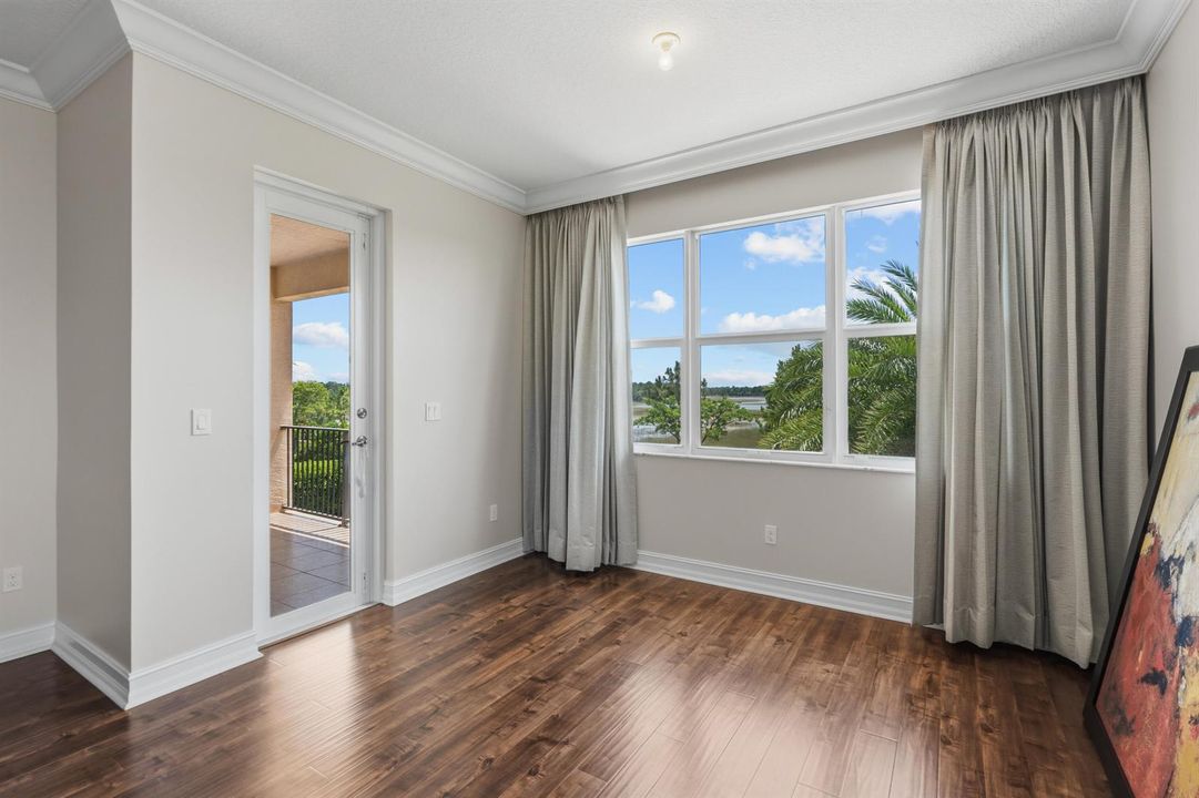 Primary suite with balcony access