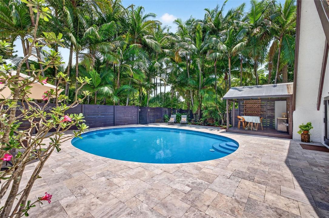 Travertine Deck surrounding beautiful large pool