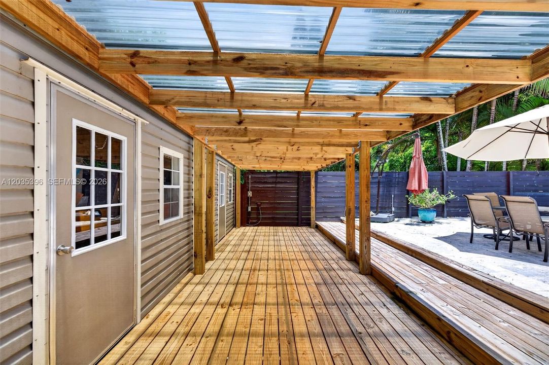Additional 2 more beautiful air conditioned sheds (in addition to the storage off the driveway) which can be used for office space, as well as outdoor covered storage area