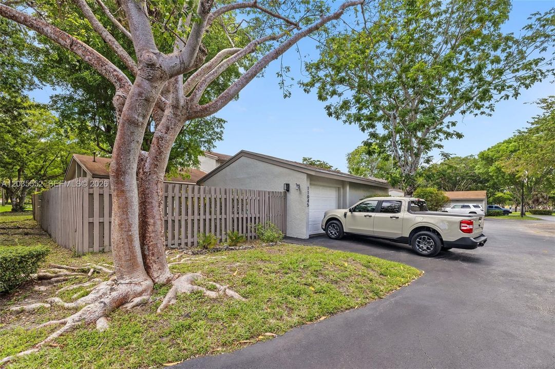 Private garage plus driveway parking for an additional vehicle