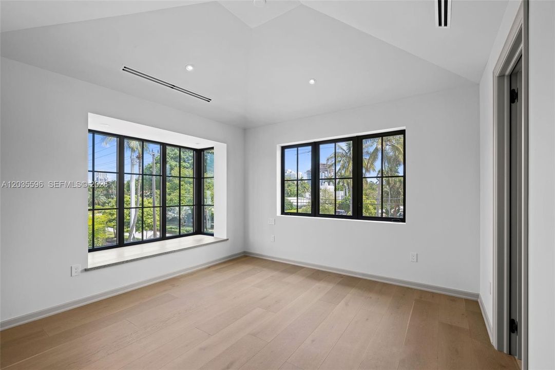 Second floor bedroom has huge window box seat