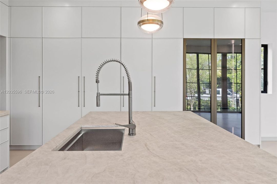 Kitchen island has cabinets beneath it