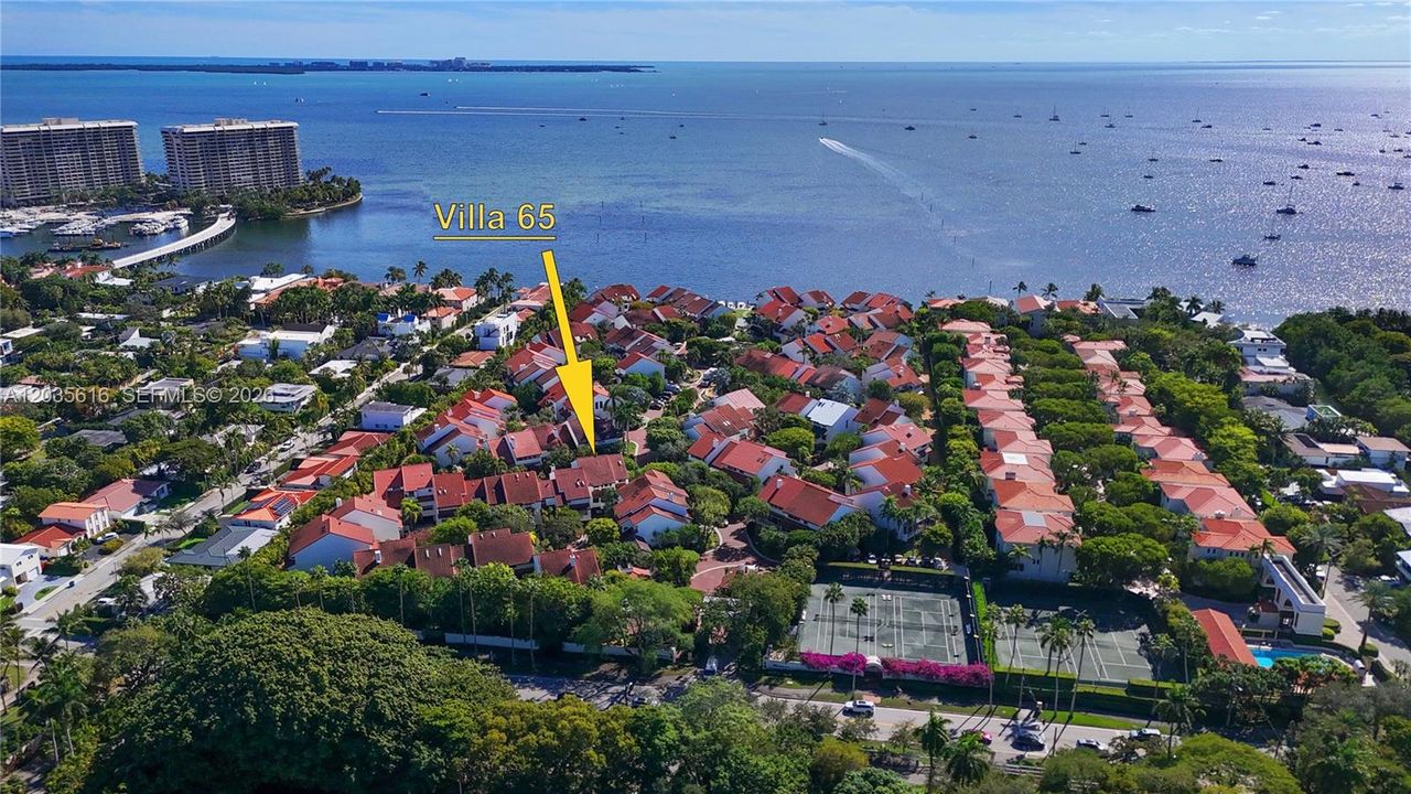 Yellow arrow depicting location of Villa #65