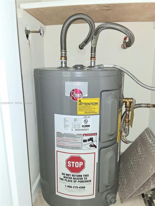 NEWER HOT WATER HEATER