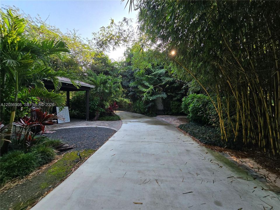 Venue driveway entrance with pergola for valet parking