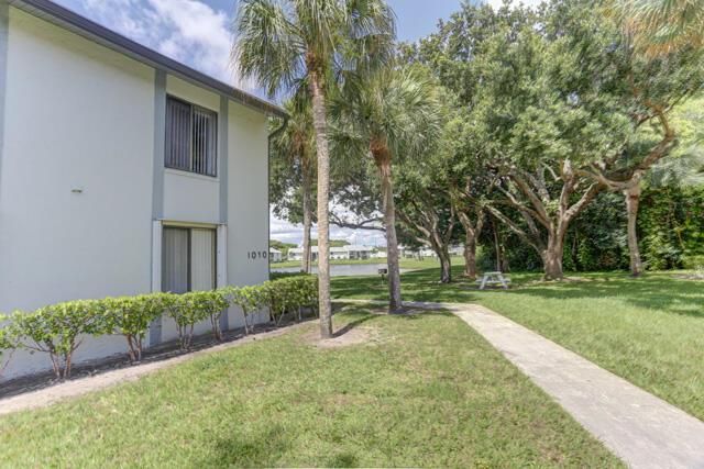 Path to lake 1010 Green Pine Blvd E1 WPB