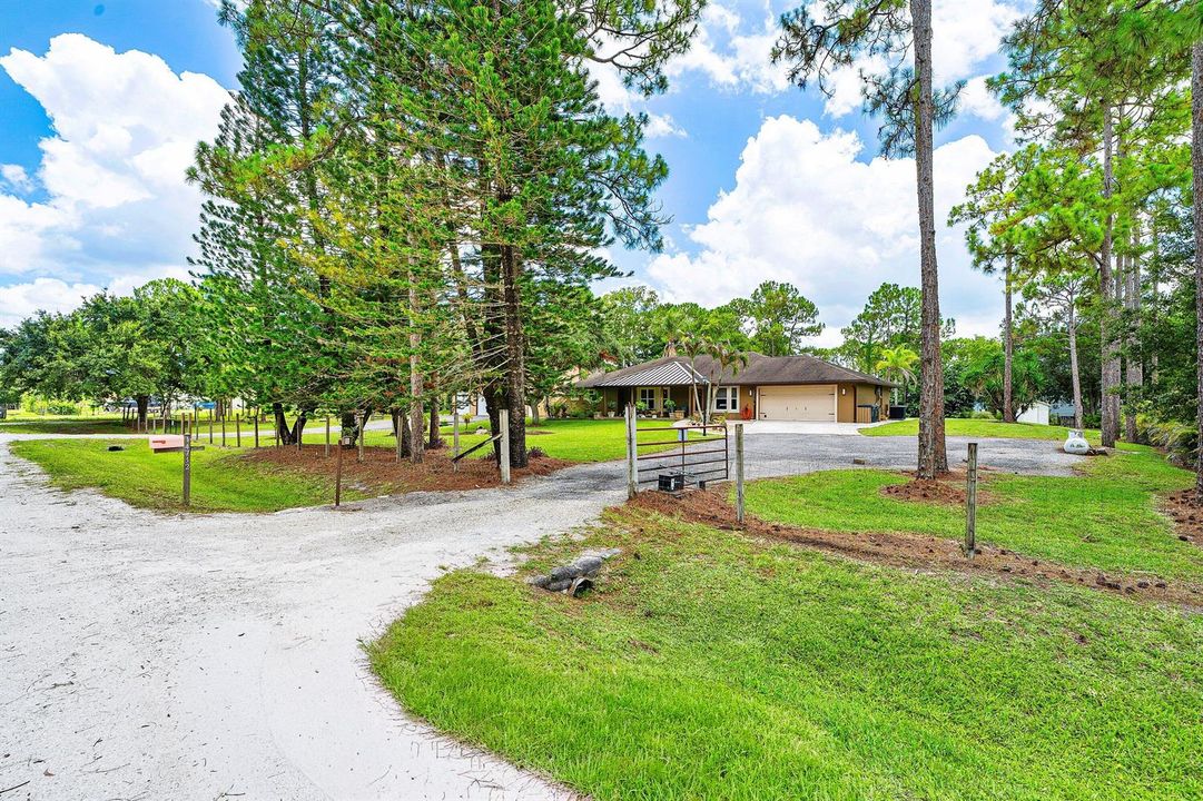 001-1473263rdCourtNorth-TheAcreage-FL-33