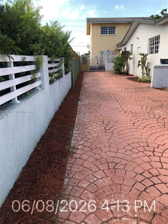 Front unit side driveway