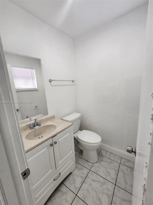 1/2 BATH DOWNSTAIRS