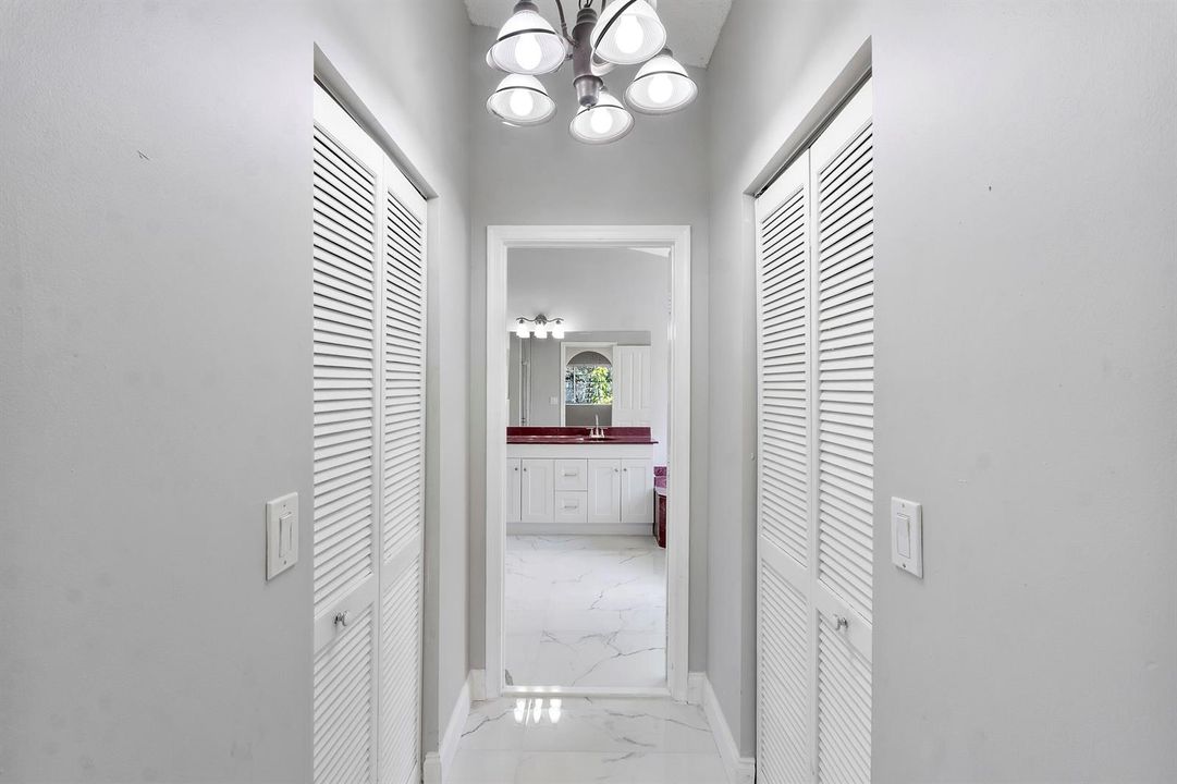 Master hallway to bath