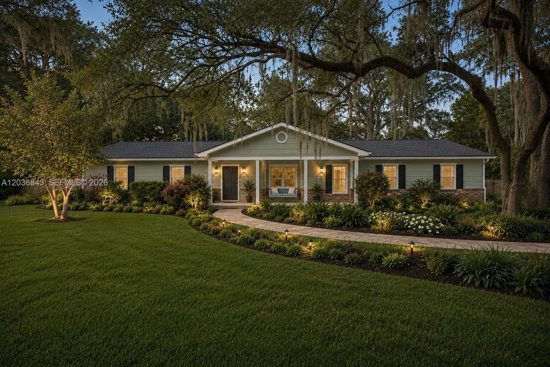 Virtually staged to show possible landscaping and paint