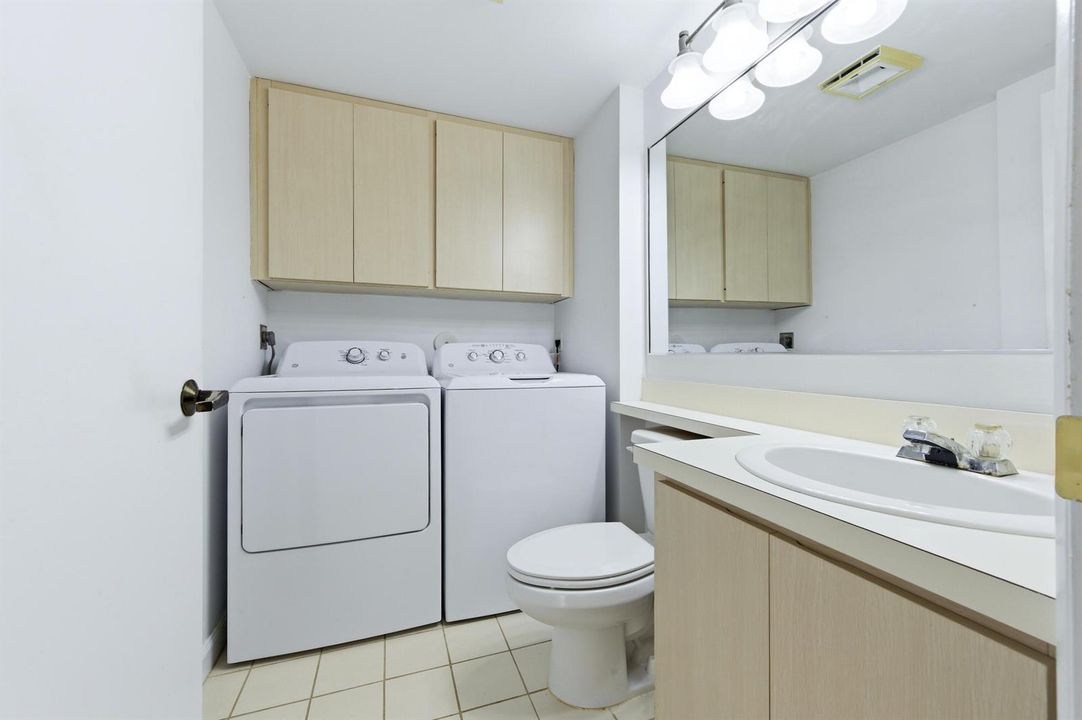 Laundry and half bathroom