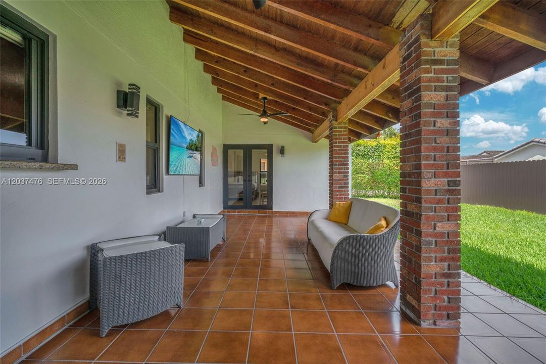 Backward patio for entertainment.