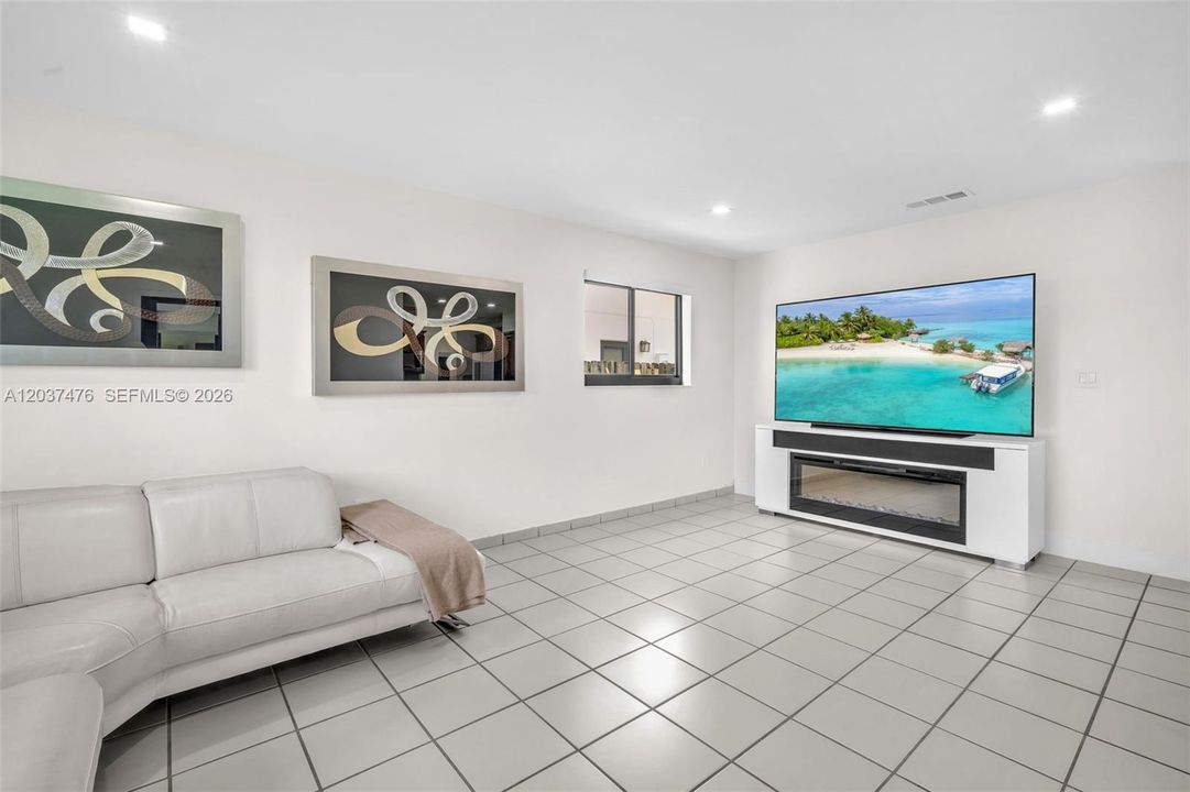 Large family room with backward access.