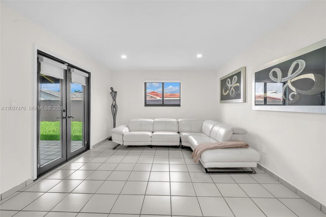 Large family room with backward access.