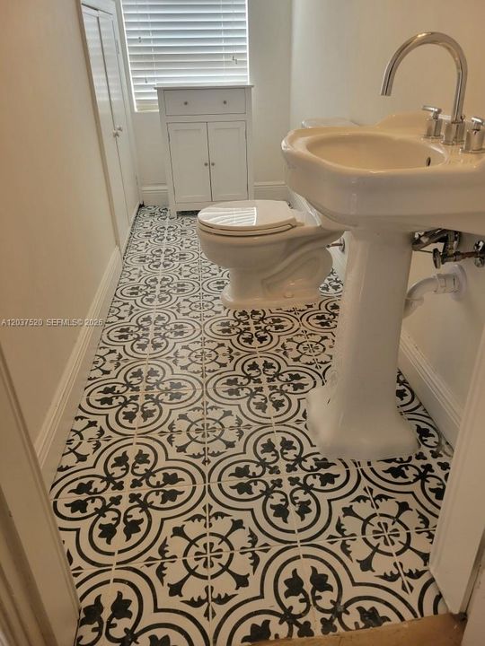 First Flr powder room, recently renovated.