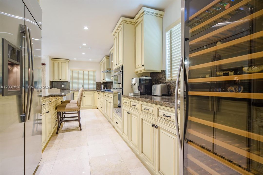 Gourmet Kitchen with Wine Chiller and plenty of storage.