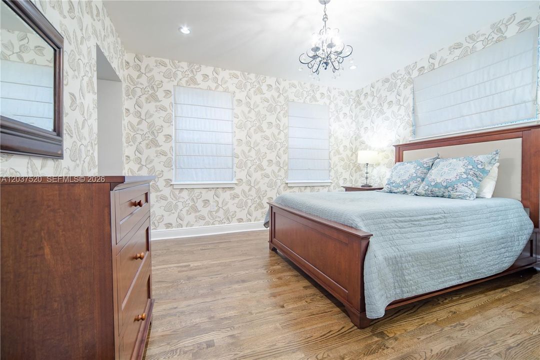 Downstairs Bedroom with private bathroom and access to outside.