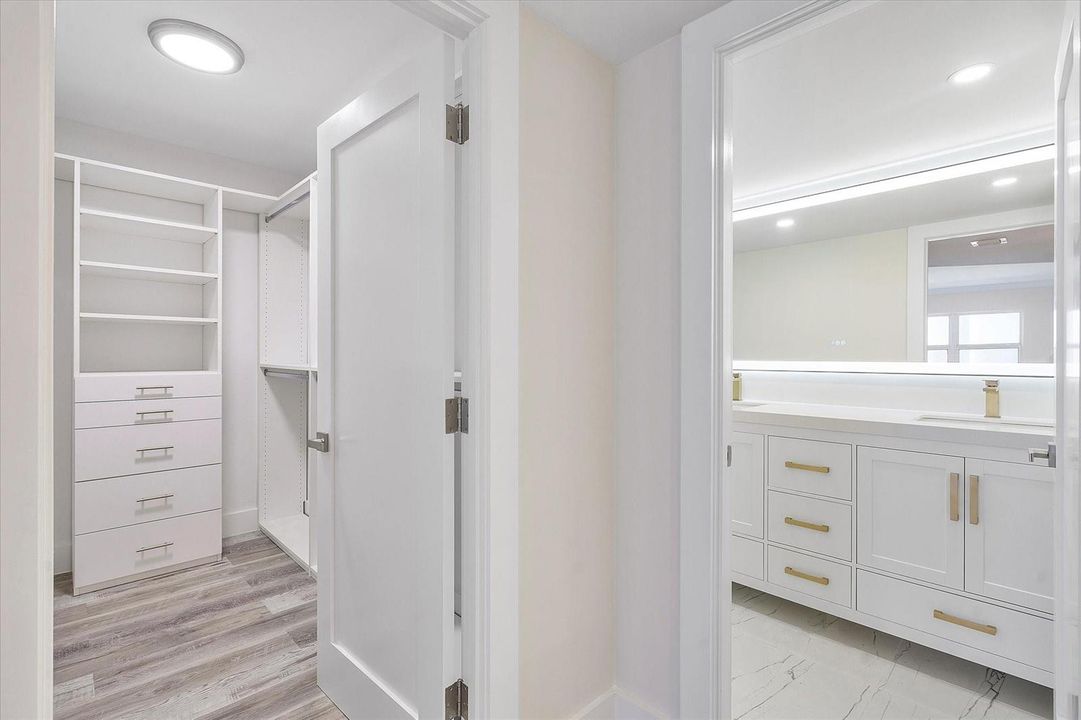 WALK-IN CLOSET & MASTER BATHROOM