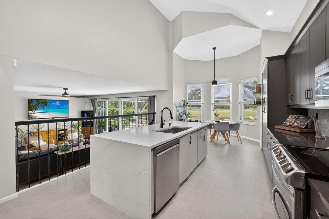 Kitchen overlooking Family and Pool