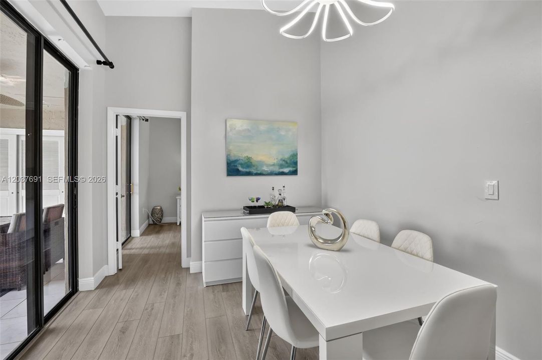 Whether enjoying a quiet breakfast or gathering with friends for dinner, this inviting dining space offers the perfect blend of openness, elegance and connection to the outdoors