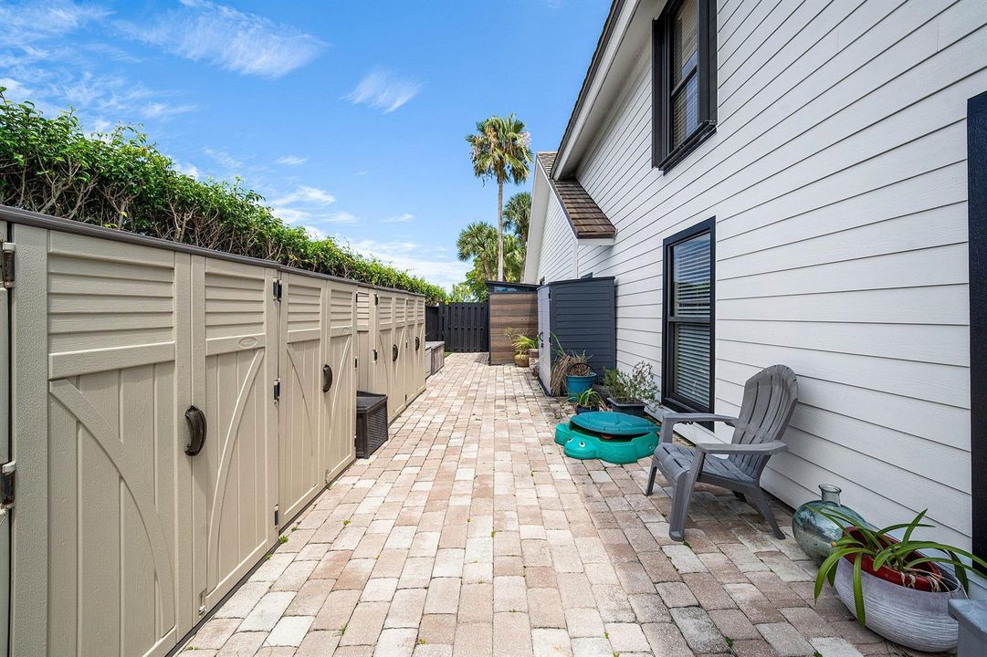 Side of Home Paved Patio Storage
