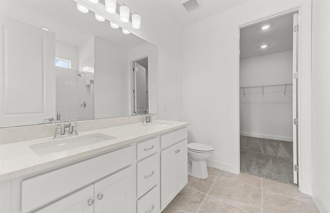 SWFL_PU_28030_Crestmere_OwnersBath1