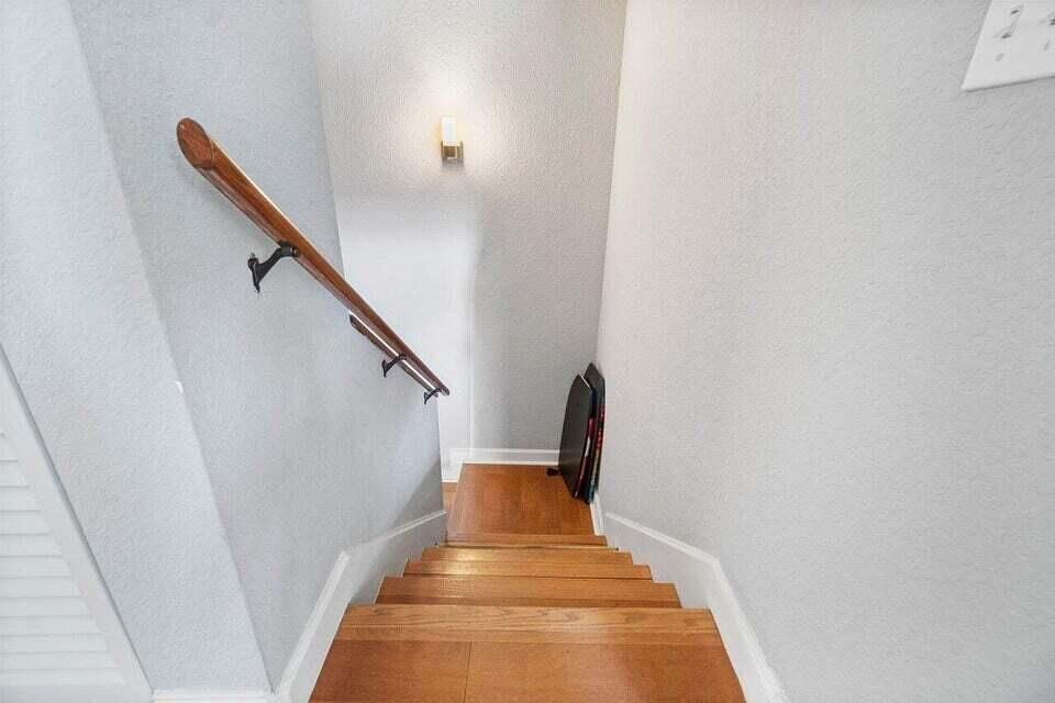 STAIRS TO BEDROOM AND BATHS