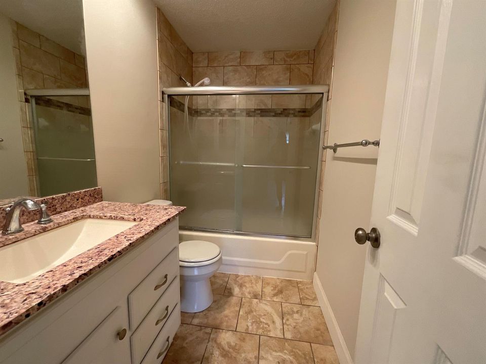 Bathroom 1 with tub and shower
