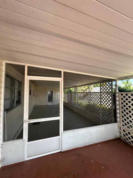 Screened Patio behind Carport