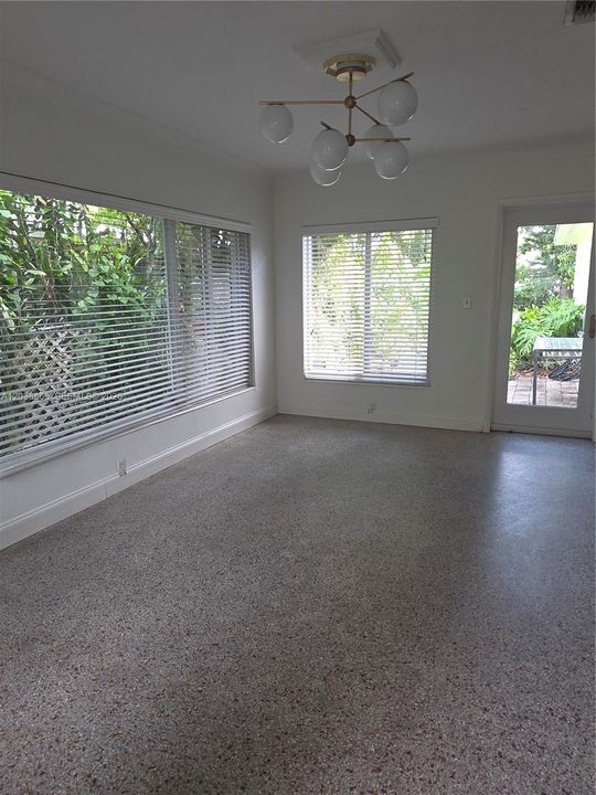 LIVING ROOM WITH LOTS OF LIGHT AND IMPACT GLASS WINDOWS