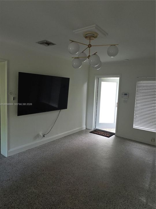 INCLUDES LARGE SCREEN TV