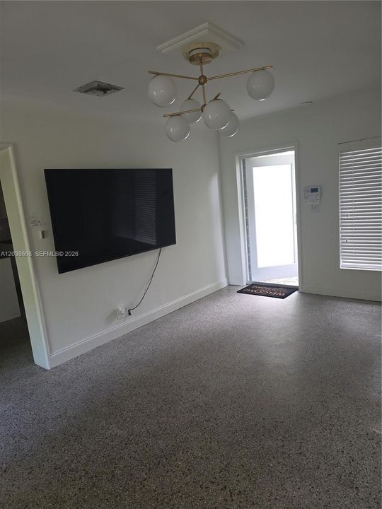 FRONT DOOR ENTRY TO LIVING ROOM