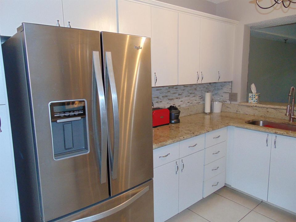 DUTCH DOOR REFRIGERATOR BOTTOM FREEZER