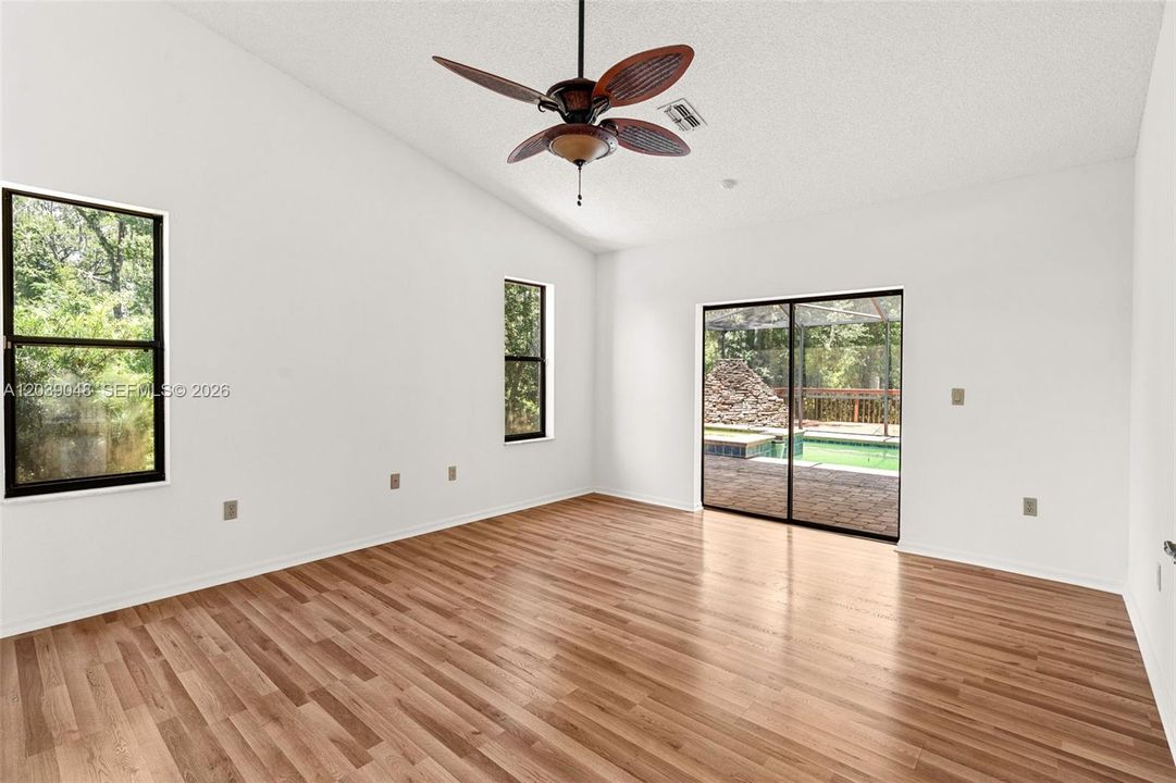 Generous primary bedroom with a comfortable layout, offering privacy and a quiet retreat within the home.