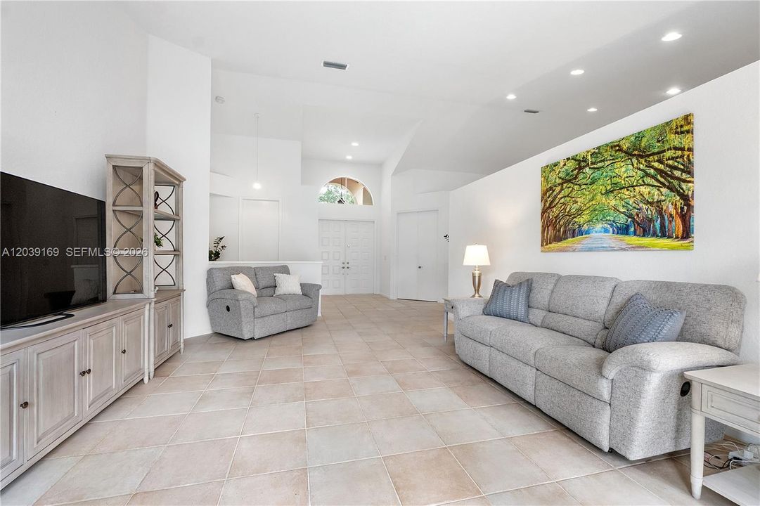 Large living room - view towards front door & office/4th bedroom