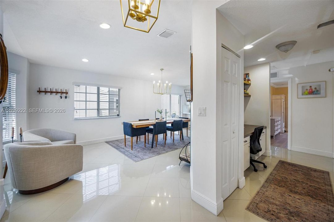 Sitting room dining and kitchen to left.  bedrooms and living room to the right
