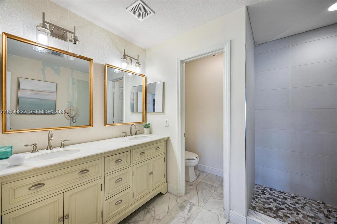 En suite Primary Bath, Double sinks, Walk in Shower