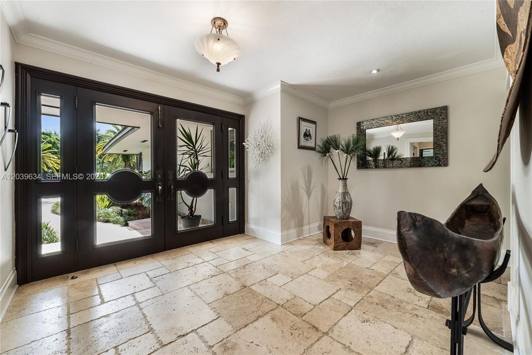 Beautiful formal entry with mahogany doors