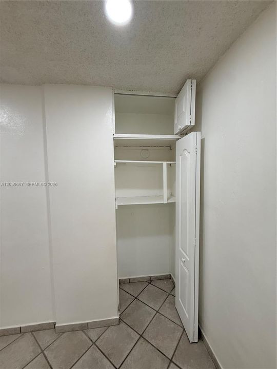 Extra closet primary bedroom