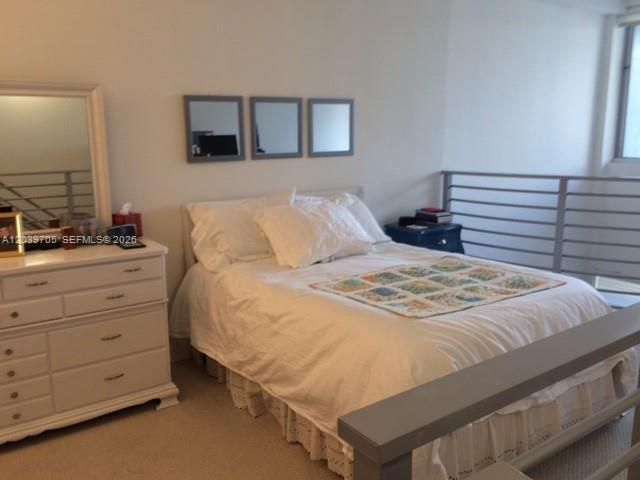 Bedroom with king size bed.
